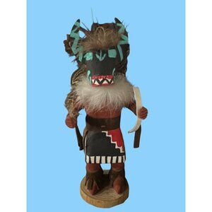 Handcrafted Wooden Kachina Doll With Feather Accents & Painted Details In Protec
